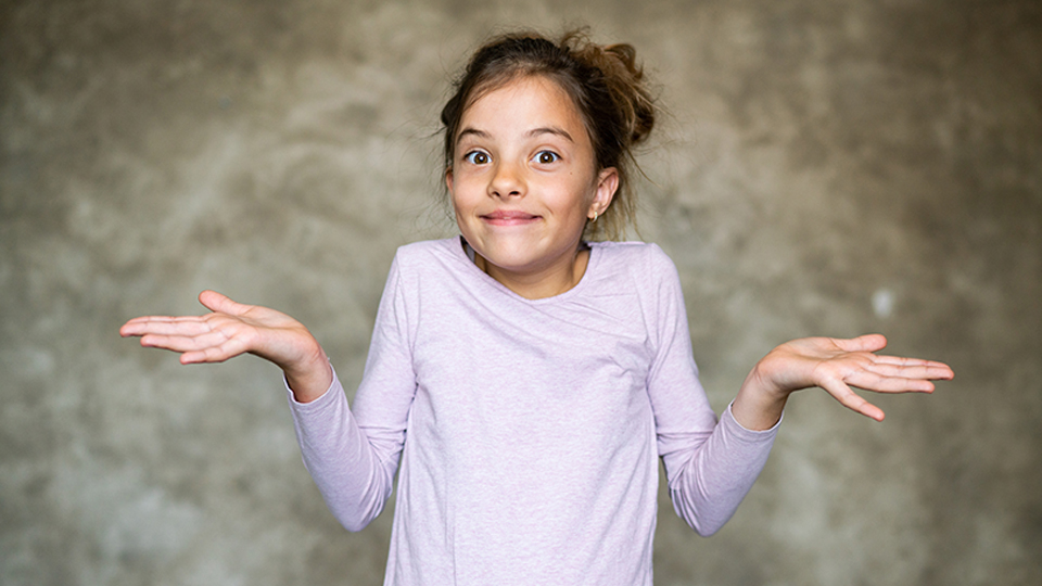 Girl gesturing with palms up
